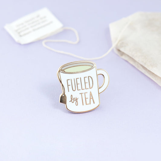 fueled by tea enamel pin - the salty hive