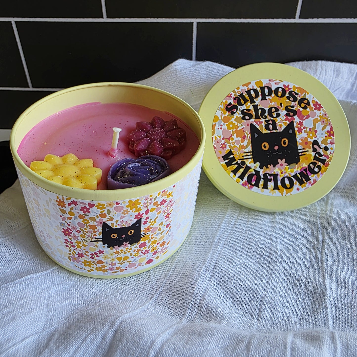 suppose she's a wildflower candle