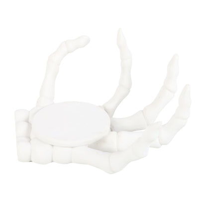 skeleton hand candle holder