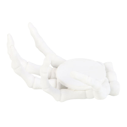 skeleton hand candle holder